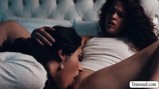 TS stepmom and her curly haired stepdaughter are on the bed kissing each other.After that,she licks and fucks her stepdaughters pussy.