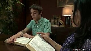 Big tits brunette shemale TS Foxxy seduces young stud Matthew in library then bends him over table and fingers and fucks his tight asshole