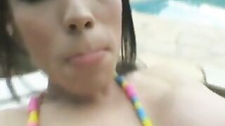 Shemale babe Sukuki tugging her cock poolside