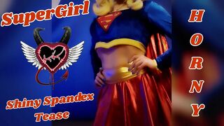 SuperGirl in Shiny Spandex Teases and Plays with Herself