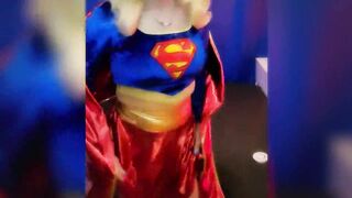 SuperGirl in Shiny Spandex Teases and Plays with Herself