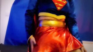 SuperGirl in Shiny Spandex Teases and Plays with Herself